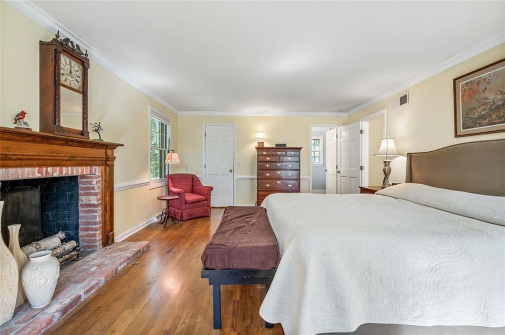 2375 Fairhill Farms Road Sewickley, PA 15143 - Photo 13 of 25 a bed room with furniture and a fireplace