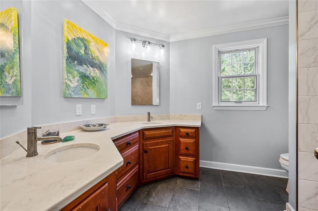 2375 Fairhill Farms Road Sewickley, PA 15143 - Photo 14 of 25 a kitchen that has a sink and a chair in it