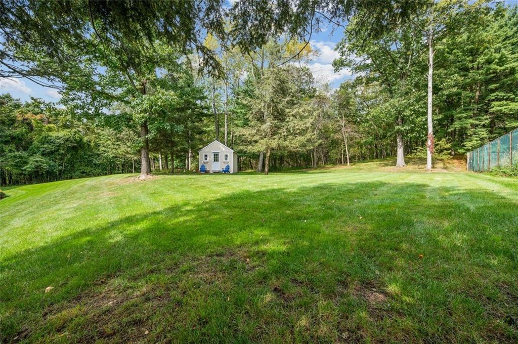 2375 Fairhill Farms Road Sewickley, PA 15143 - Photo 22 of 25 a view of a big yard with grass and trees