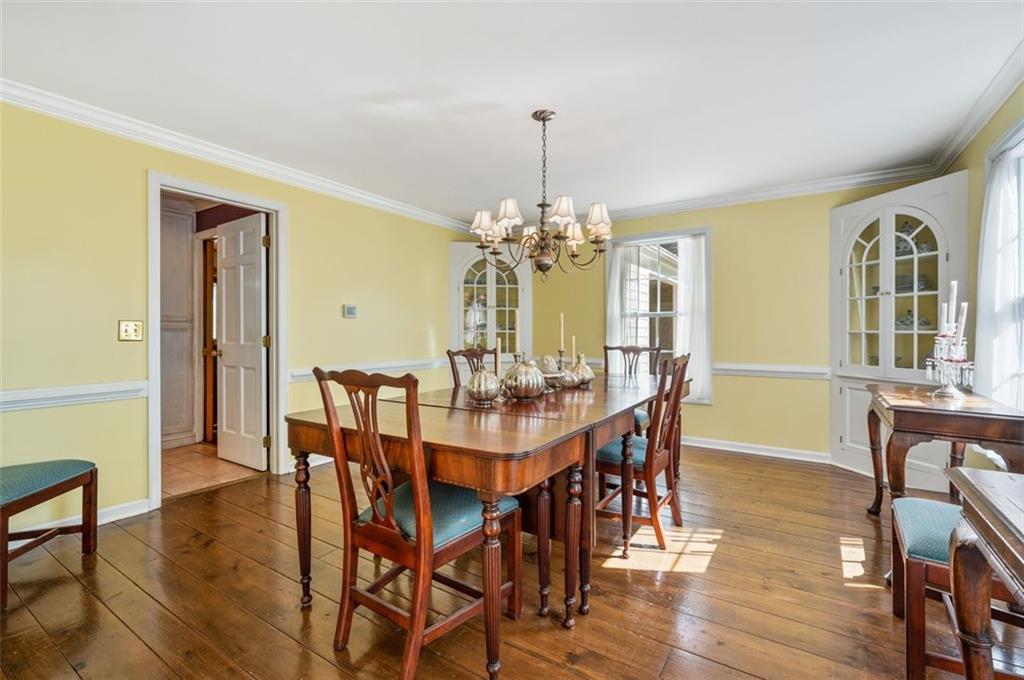 2375 Fairhill Farms Road Sewickley, PA 15143 - Photo 5 of 25 a view of a dining room with furniture window and wooden floor