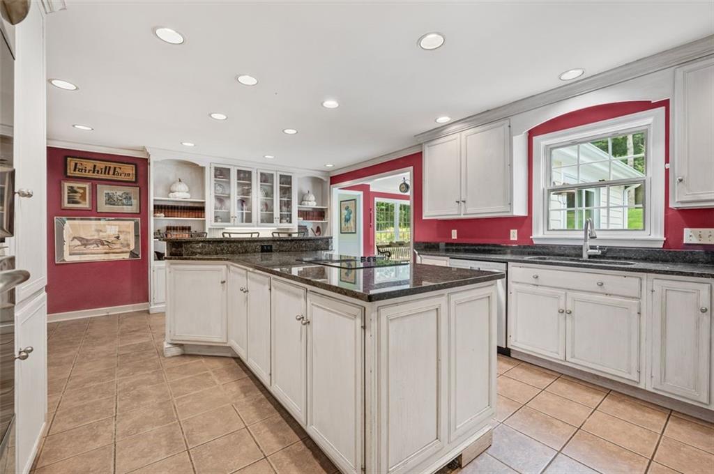 2375 Fairhill Farms Road Sewickley, PA 15143 - Photo 6 of 25 a kitchen with granite countertop a sink and cabinets