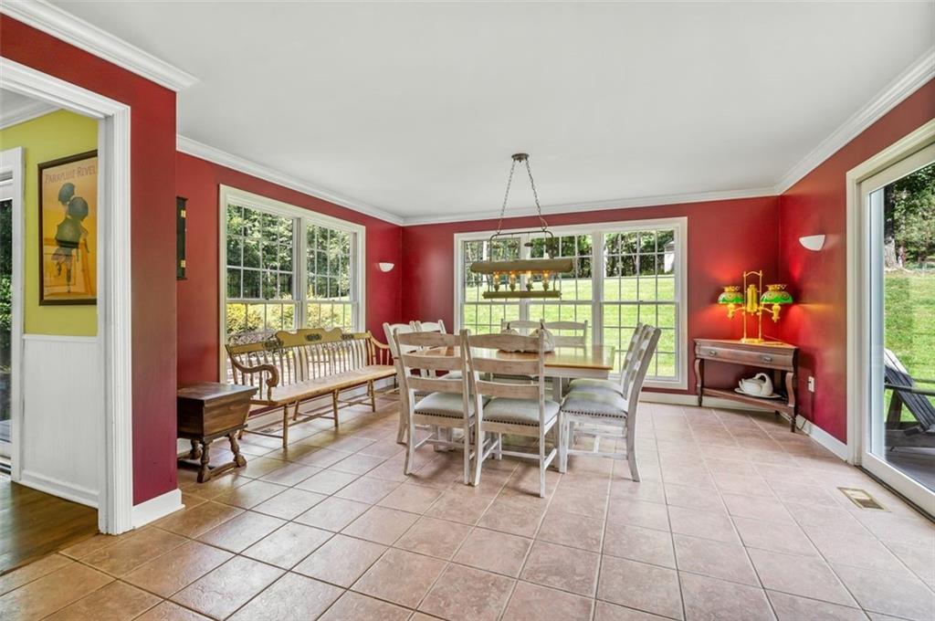 2375 Fairhill Farms Road Sewickley, PA 15143 - Photo 9 of 25 a view of a dining room with furniture window and outside view
