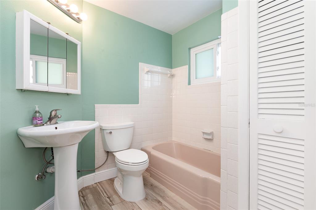 5108 Commonwealth Road Palmetto, FL 34221 - Photo 15 of 31 a bathroom with a sink toilet and shower