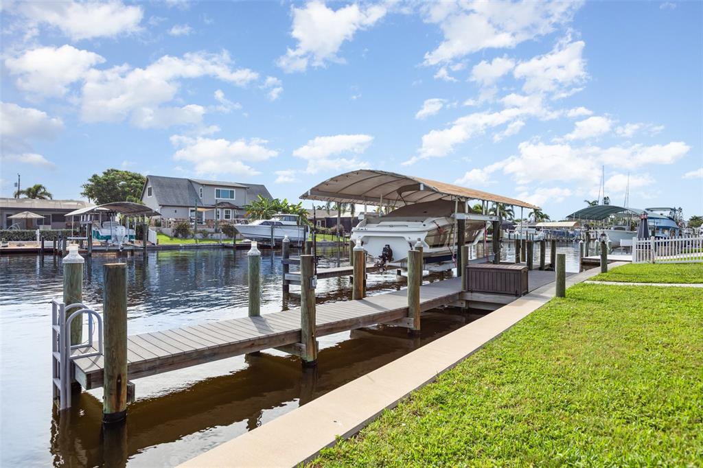 5108 Commonwealth Road Palmetto, FL 34221 - Photo 18 of 31 a view of a lake with a yard