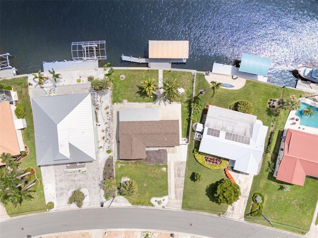 5108 Commonwealth Road Palmetto, FL 34221 - Photo 25 of 31 aerial view of a house with a swimming pool