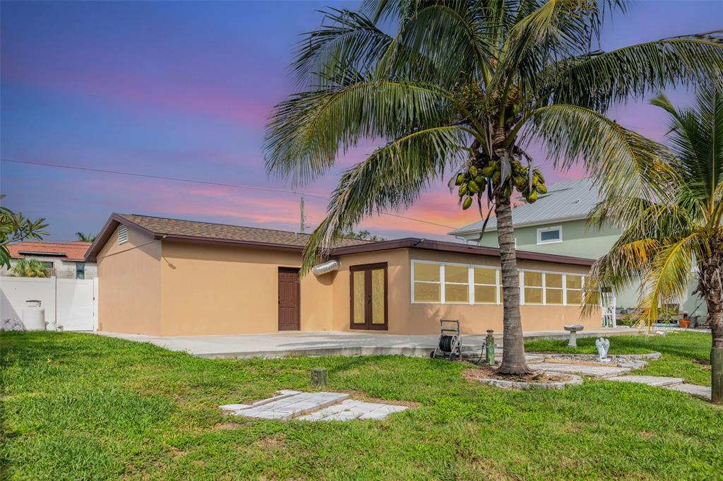 5108 Commonwealth Road Palmetto, FL 34221 - Photo 30 of 31 a front view of house with yard and green space