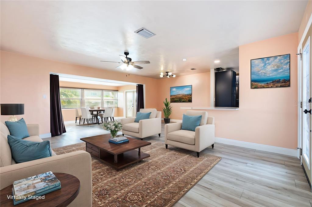 5108 Commonwealth Road Palmetto, FL 34221 - Photo 4 of 31 a living room with furniture and wooden floor