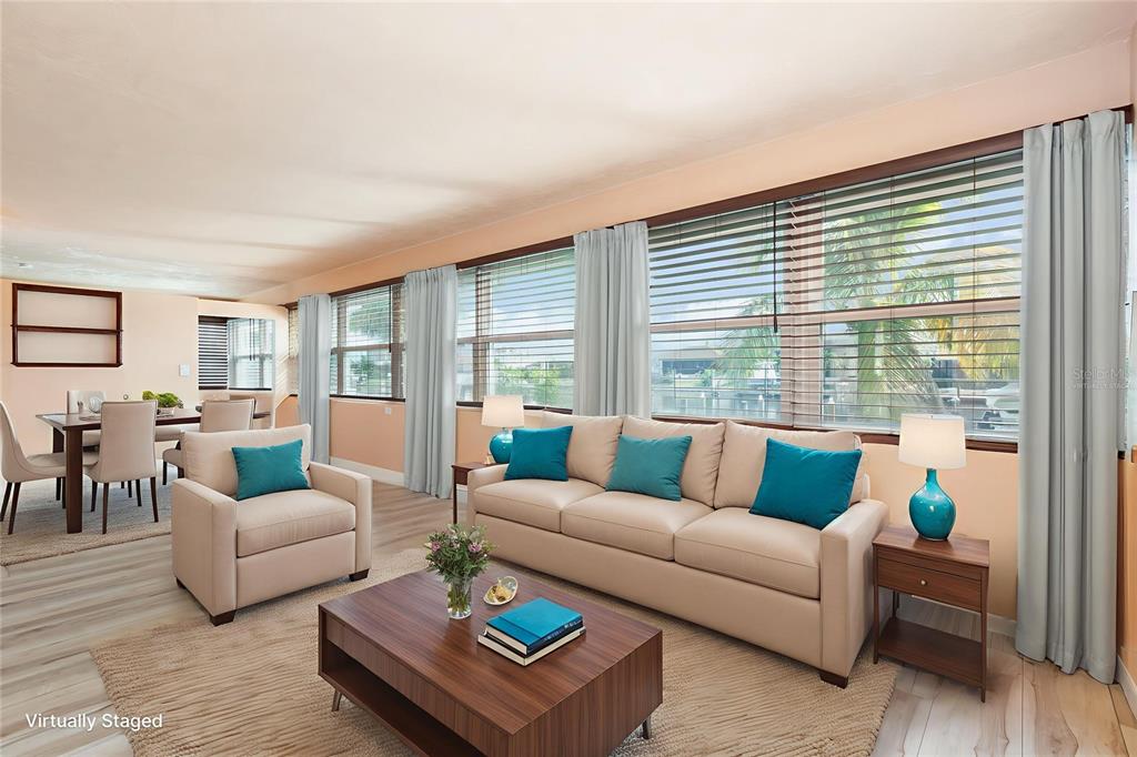 5108 Commonwealth Road Palmetto, FL 34221 - Photo 5 of 31 a living room with furniture and a large window