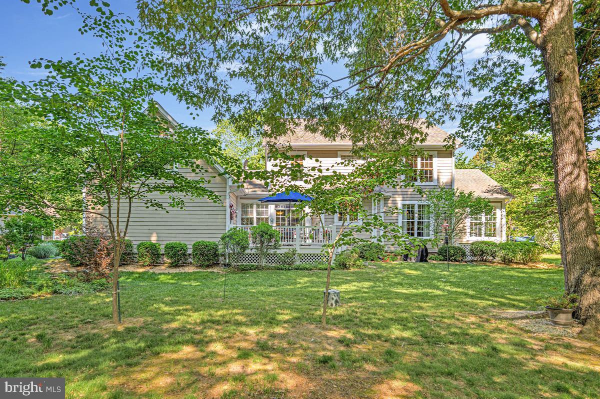 11565 Magnolia Court Issue, MD 20645 - Photo 42 of 68 a view of a house with a big yard plants and large trees