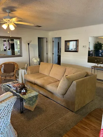 a kitchen with a stove a sink and a refrigerator