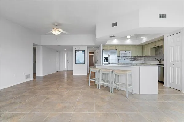a view of kitchen with counter top space and appliances
