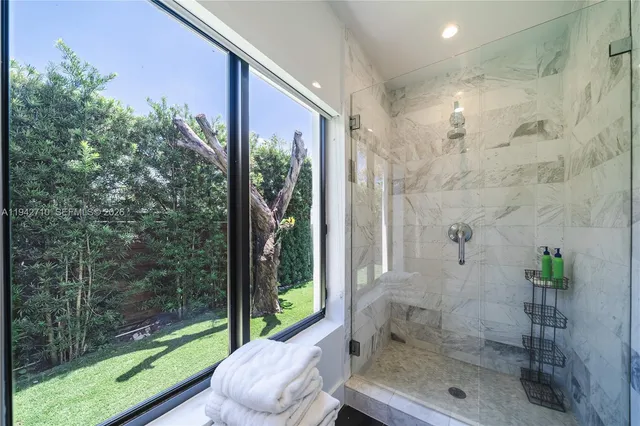 a bedroom with a bed and a table in it