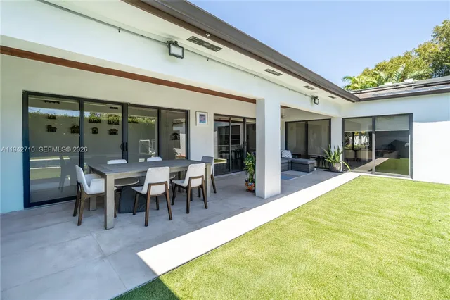 a house with garden in front of it