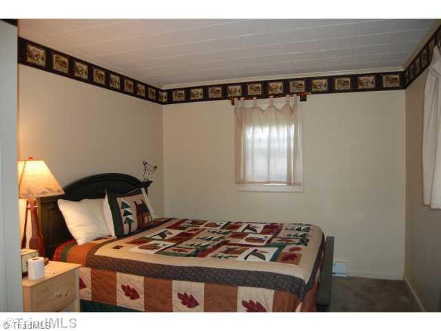 1102 Albert Phipps Road Crumpler, NC 28617 - Photo 14 of 15 Master Bedroom.