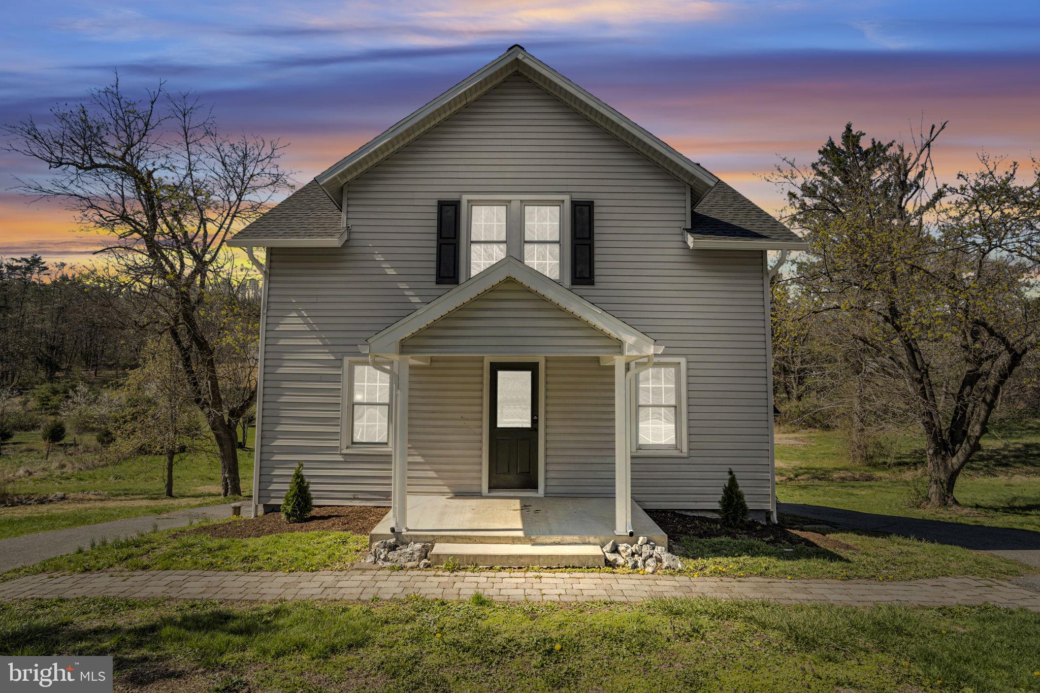 6580 Spring Road Shermans Dale, PA 17090 - Photo 2 of 37 Charming home with sunset backdrop.