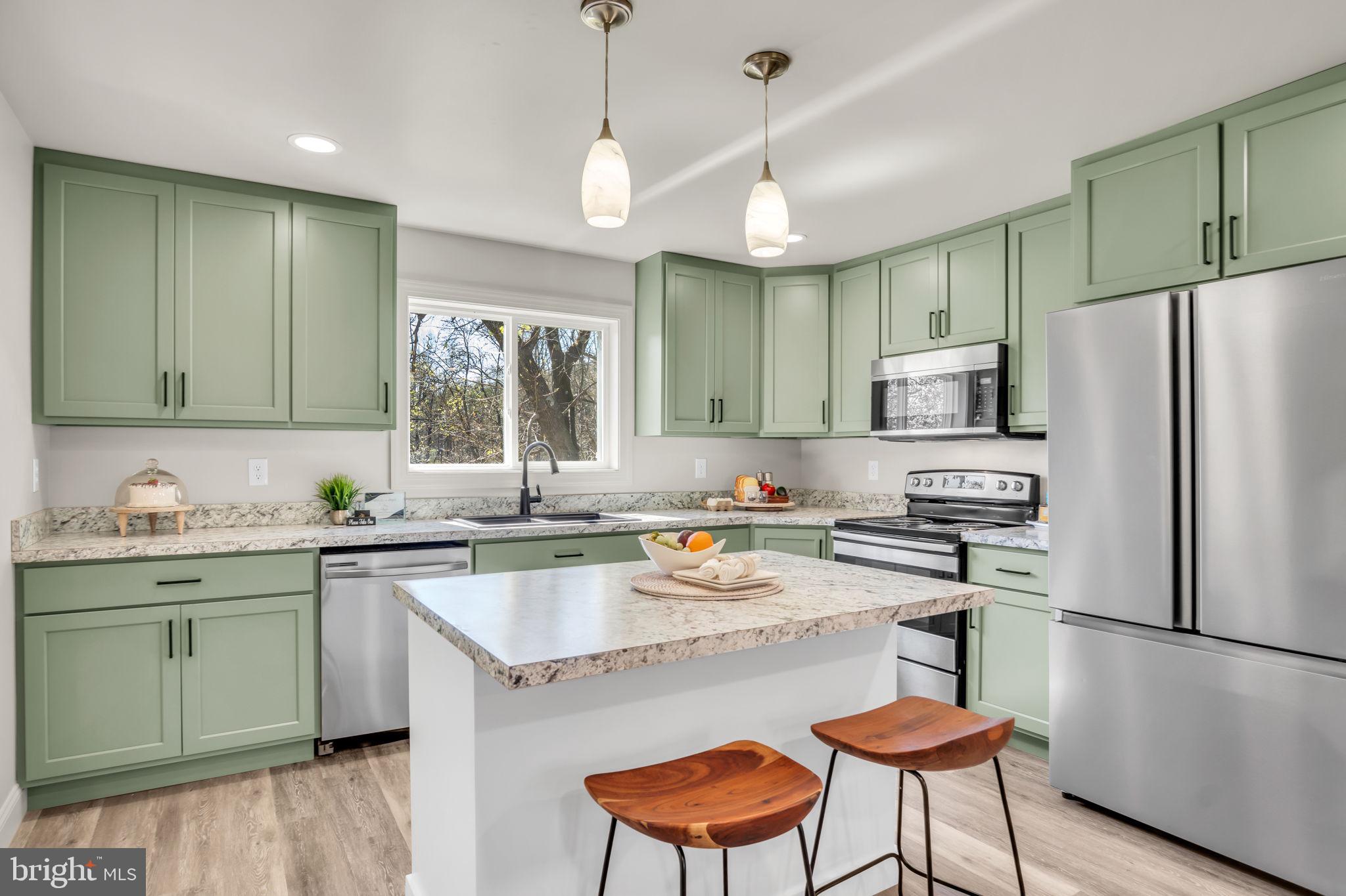 6580 Spring Road Shermans Dale, PA 17090 - Photo 10 of 37 Charming kitchen with modern flair.