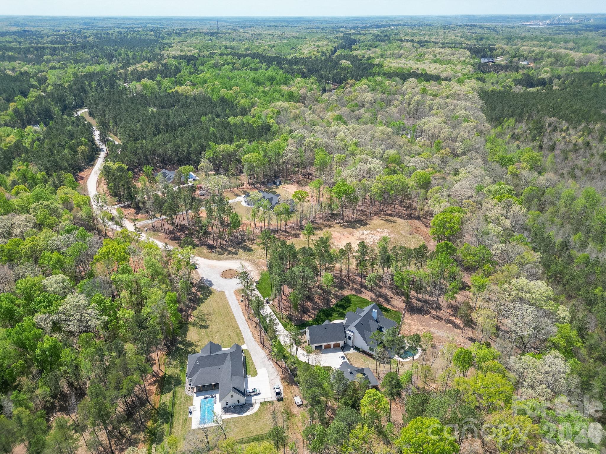 2170 Two Sisters Drive Lancaster, SC 29720 - Photo 28 of 35 an aerial view of residential houses with outdoor space and trees