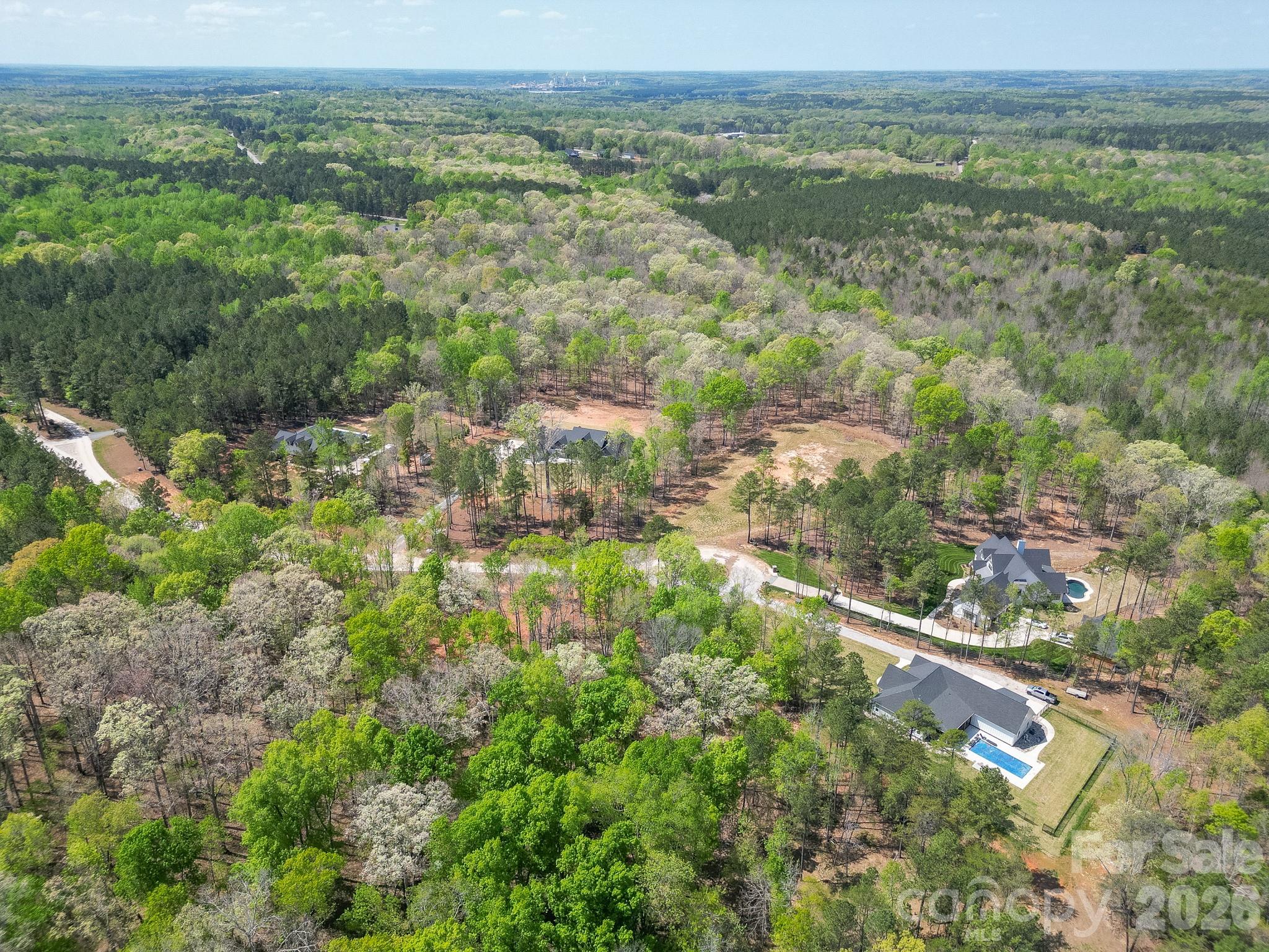 2170 Two Sisters Drive Lancaster, SC 29720 - Photo 30 of 35 a view of a city with lush green forest