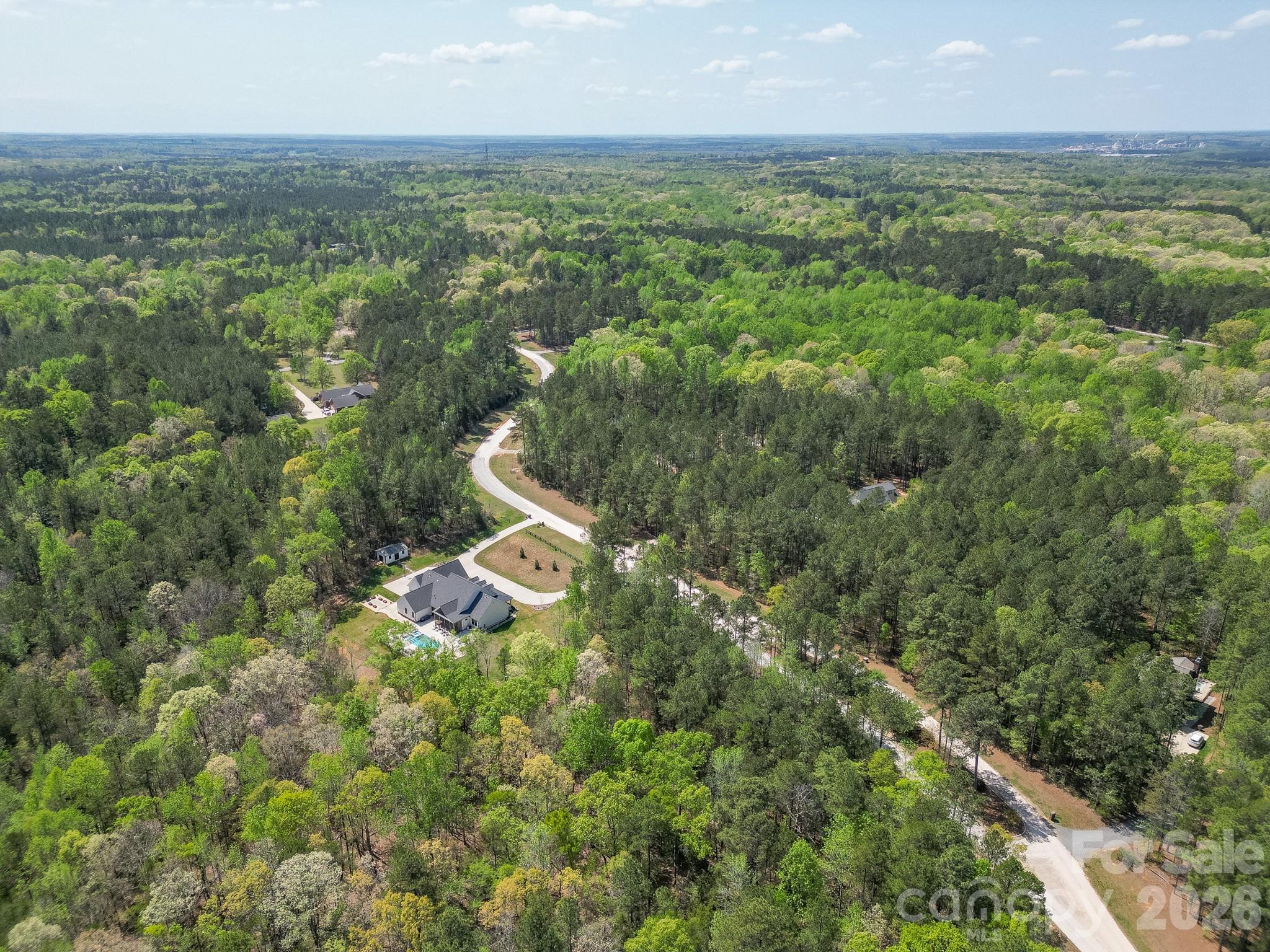 2170 Two Sisters Drive Lancaster, SC 29720 - Photo 34 of 35 an aerial view of residential houses with outdoor space and trees