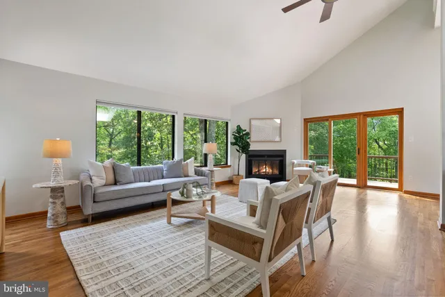 a view of a park with iron fence