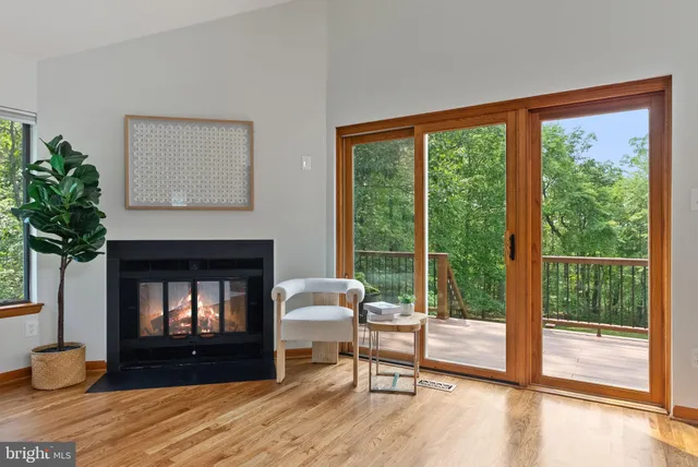 a view of a balcony with wooden floor