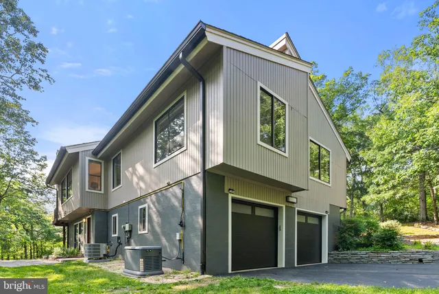 a bathroom with a shower and a shower curtain