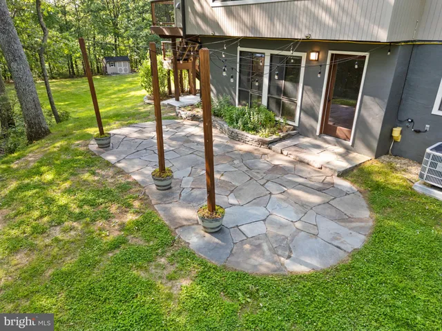 a bedroom with a bed and furniture