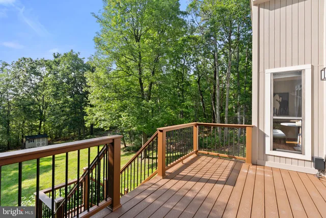 a view of a pathway with a yard