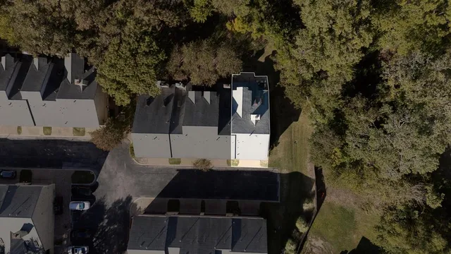a view of balcony with wooden floor