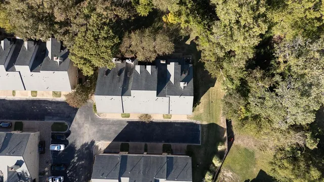 a view of balcony with wooden floor