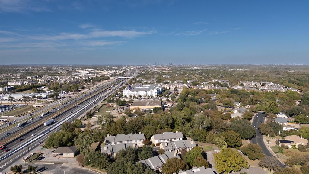 10819 Crown Colony Drive, Unit 40 Austin, TX 78747 - Photo 32 of 38 View of property location featuring a main thoroughfare