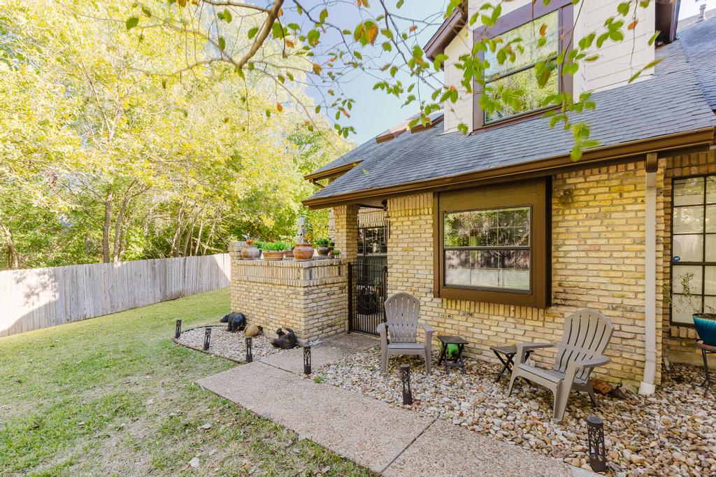 10819 Crown Colony Drive, Unit 40 Austin, TX 78747 - Photo 38 of 38 View of yard with a patio