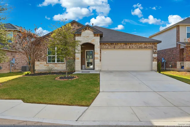 a view of a building with a yard