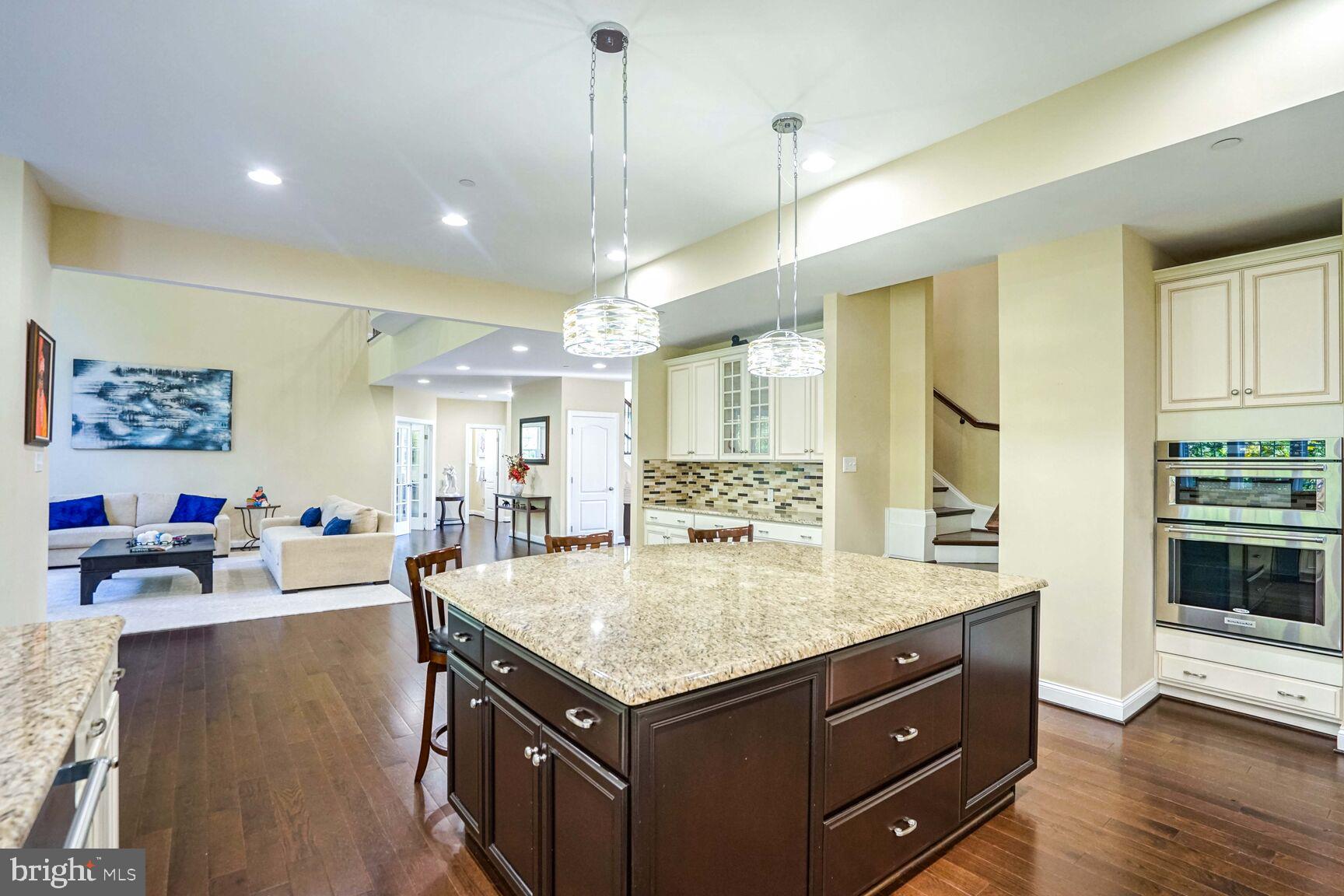 800 Lower Barn Way Olney, MD 20832 - Photo 12 of 45 a kitchen with a sink appliances and cabinets