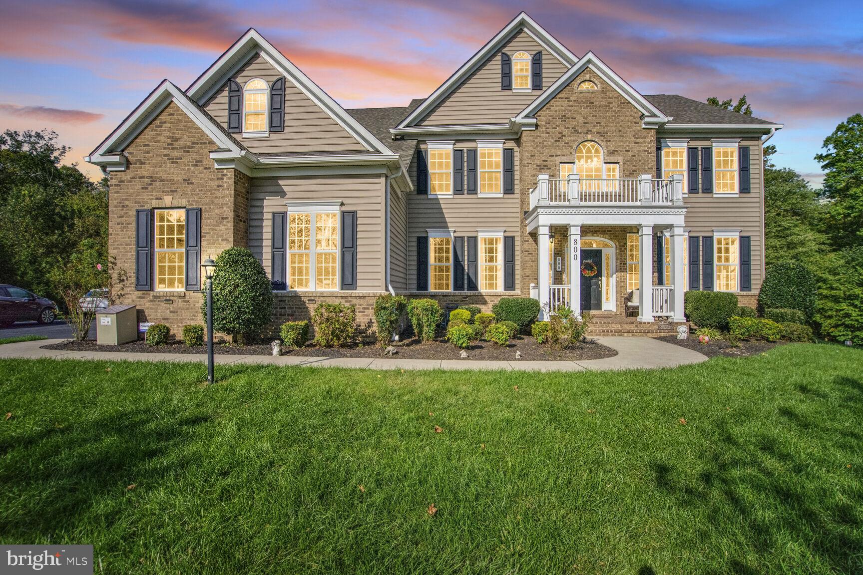 800 Lower Barn Way Olney, MD 20832 - Photo 2 of 45 a front view of a house with a yard