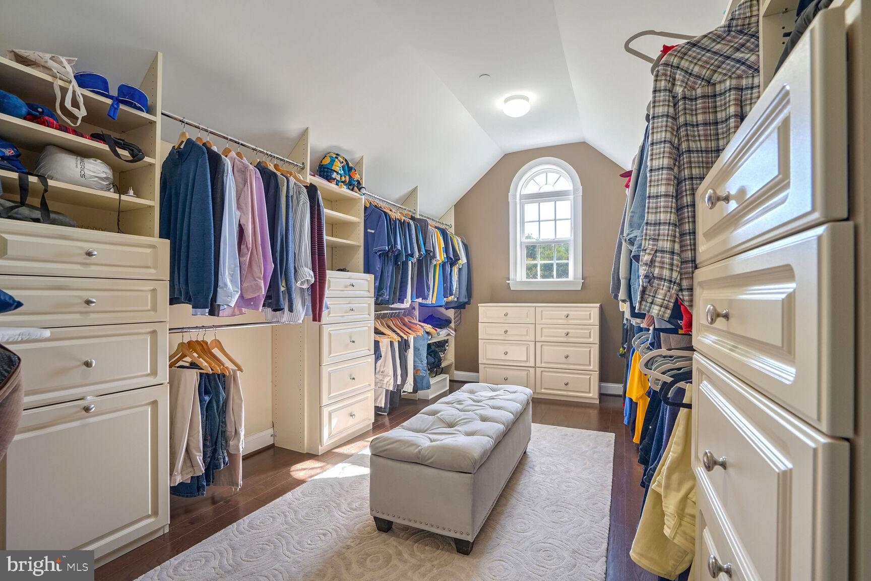 800 Lower Barn Way Olney, MD 20832 - Photo 27 of 45 a view of walk in closet with clothes and shoes