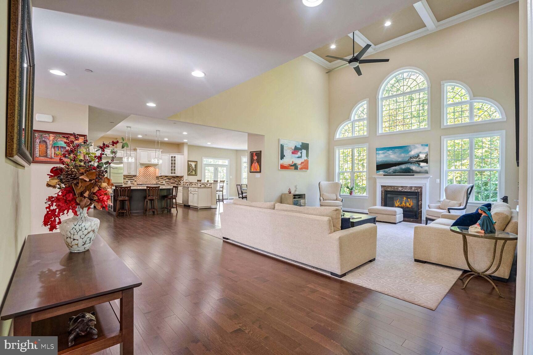 800 Lower Barn Way Olney, MD 20832 - Photo 8 of 45 a living room with furniture large window and wooden floor