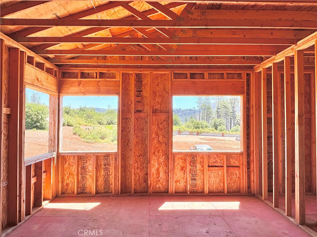6756 Rancho Oaks Road Magalia, CA 95954 - Photo 14 of 34 a view of a room with large windows and a bath tub