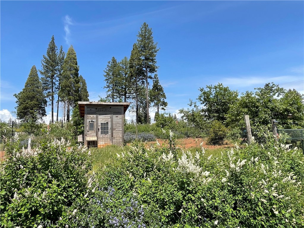 6756 Rancho Oaks Road Magalia, CA 95954 - Photo 28 of 34 a view of a house with a yard