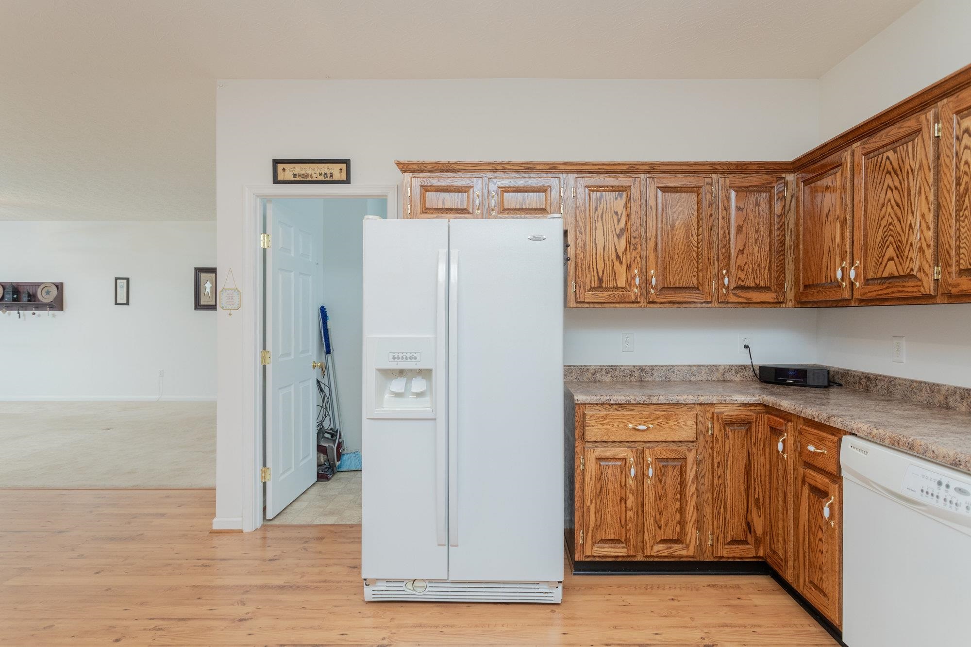 490 Leola Loop Stanley, VA 22851 - Photo 13 of 44 a white refrigerator freezer sitting inside of a kitchen