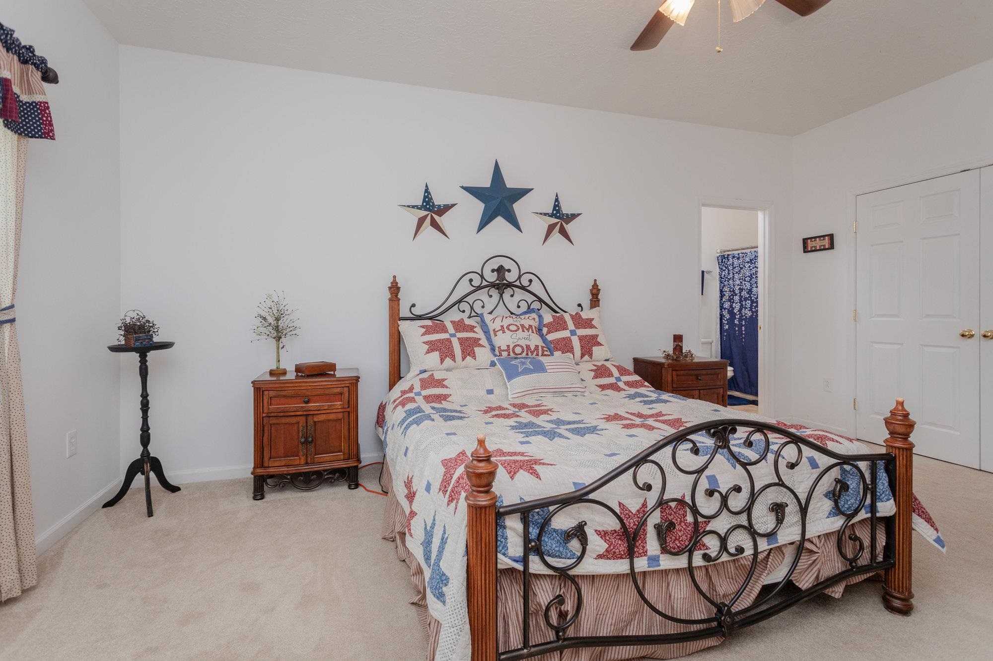 490 Leola Loop Stanley, VA 22851 - Photo 18 of 44 a bedroom with a bed and a chandelier