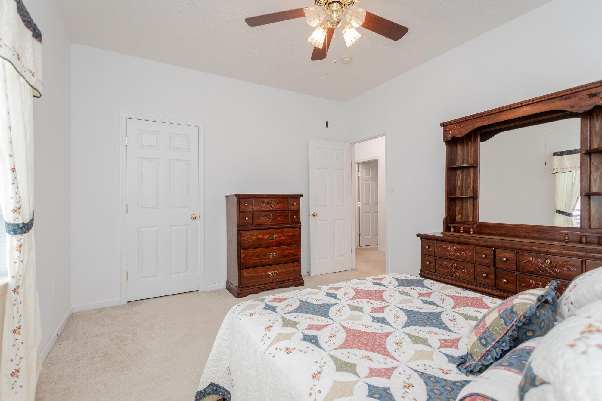 490 Leola Loop Stanley, VA 22851 - Photo 24 of 44 a bedroom with a bed and a dresser