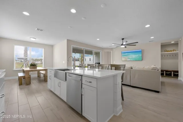 a kitchen with sink and counter top space