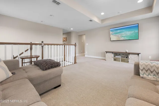 a living room with furniture and a couch