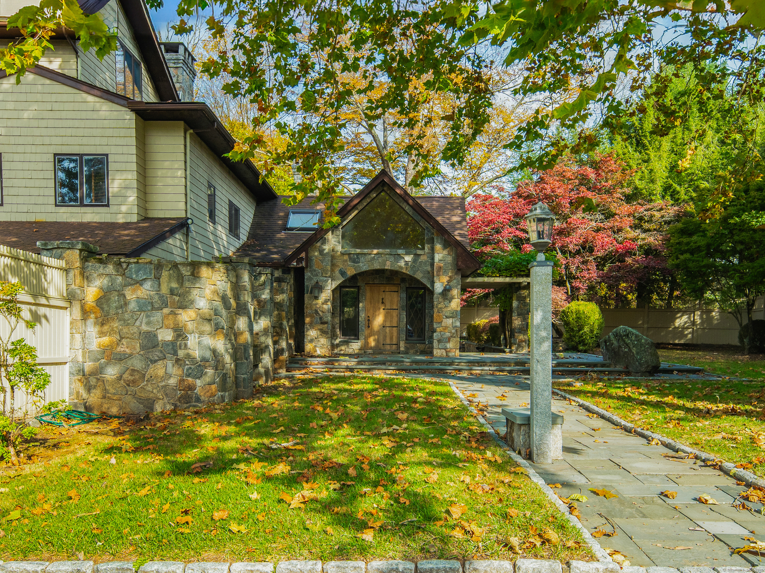 262 Lyons Plain Road Weston, CT 06883 - Photo 2 of 14 a front view of a house with swimming pool