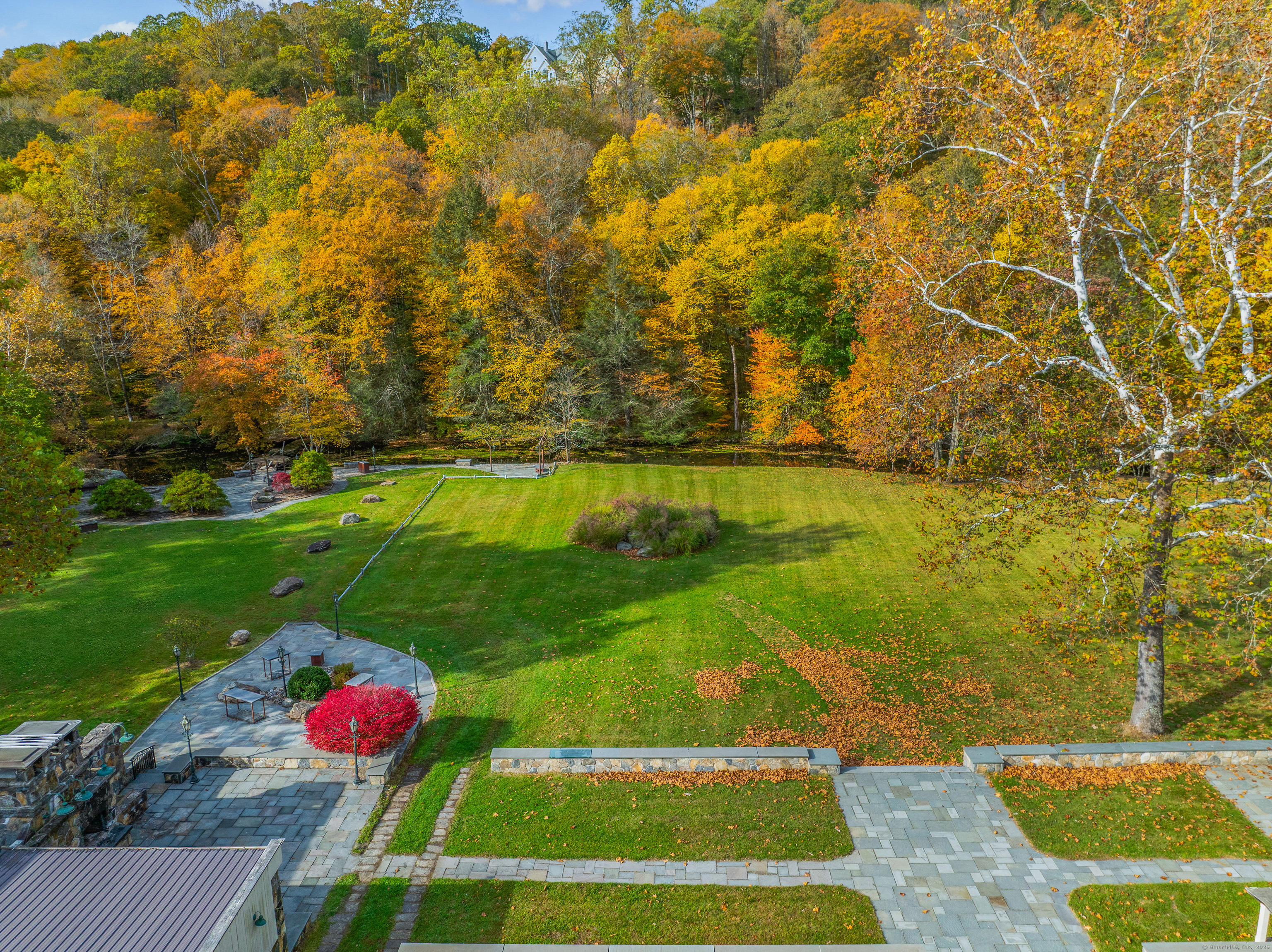 262 Lyons Plain Road Weston, CT 06883 - Photo 5 of 14 a view of yard with swimming pool and green space