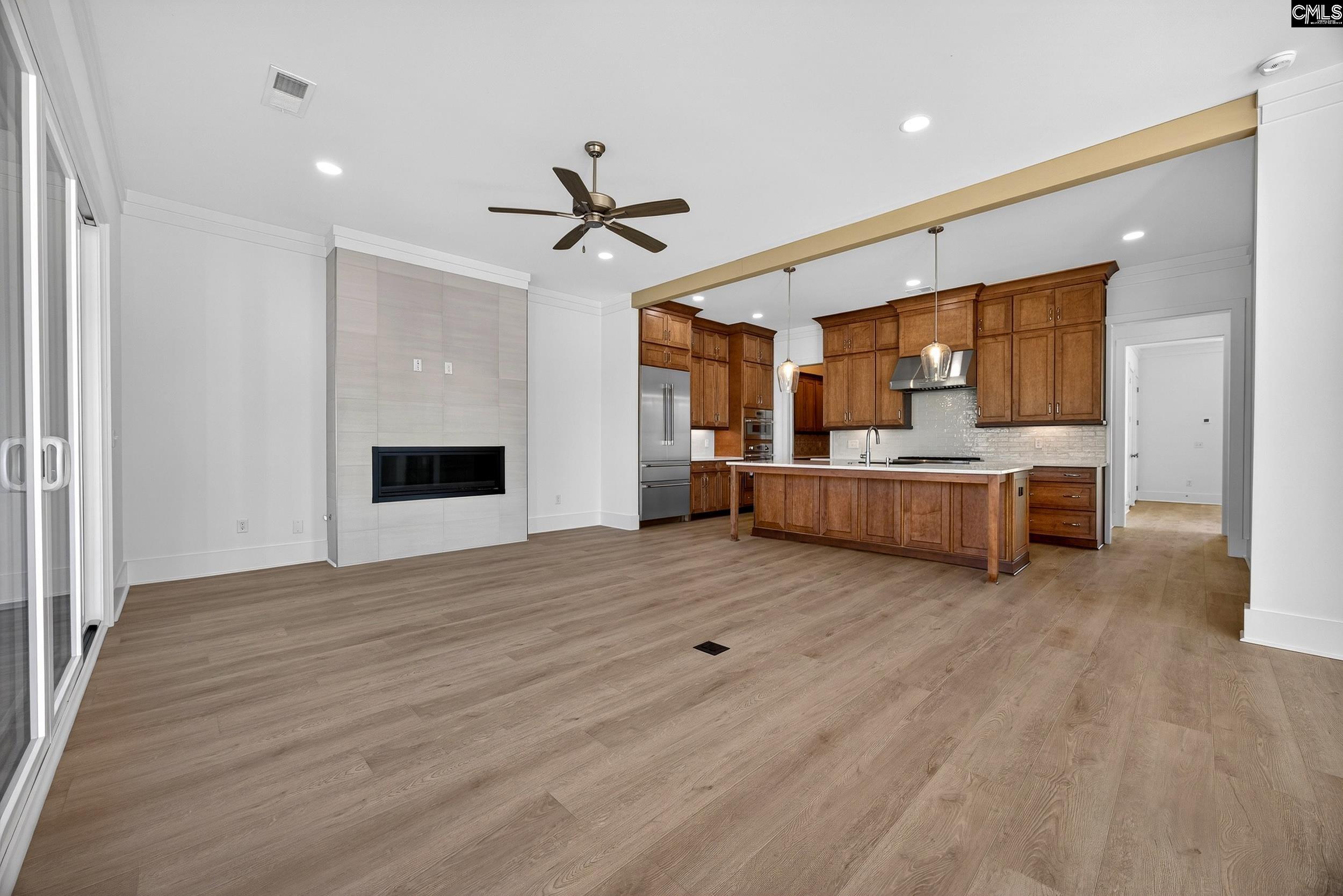 1318 Long Grove Way Lexington, SC 29072 - Photo 21 of 90 a living room with furniture and kitchen view