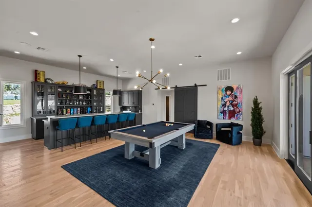 a bedroom with bed and window