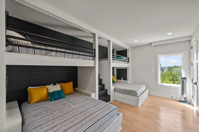 a swimming pool with outdoor seating and yard