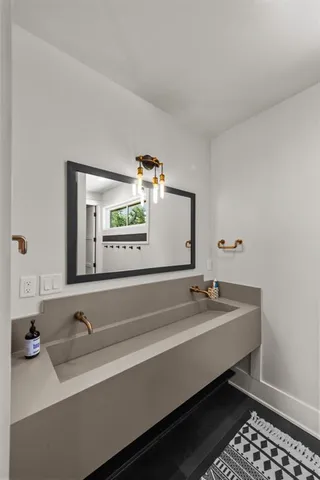 a lobby with furniture and floor to ceiling window